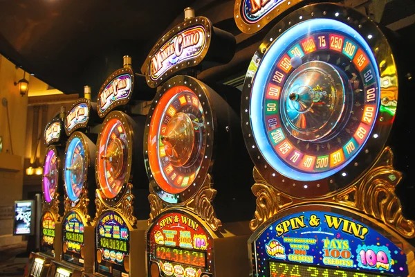 nagamas hk mobile app interface showing Liga 1 sportsbook markets and live-dealer table lobby